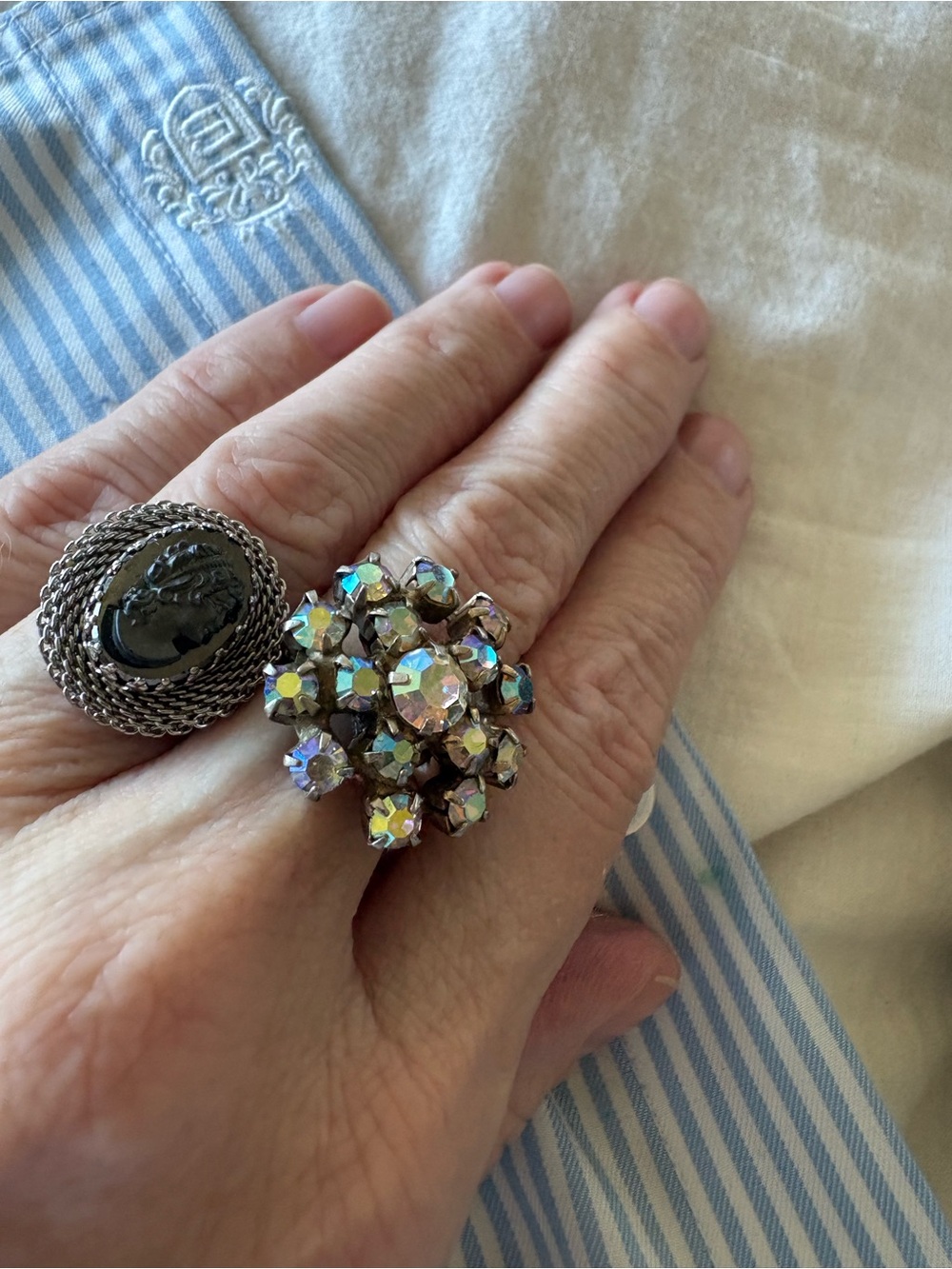 Set of two rings made from vintage clip earrings. Size adjustable.